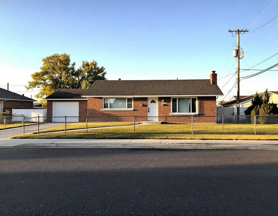 1950s brick rambler on a flat Clearfield lot