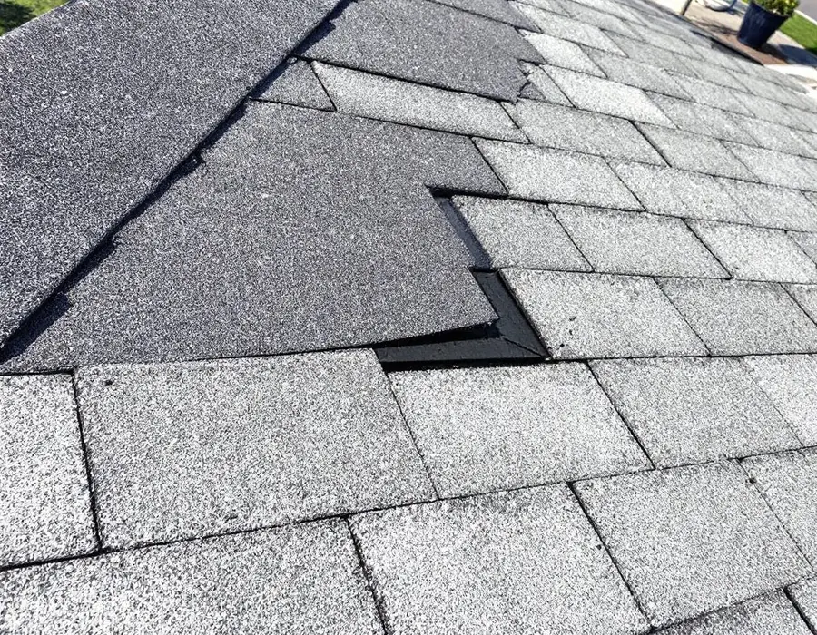 A finished repair woven neatly into the surrounding shingle courses